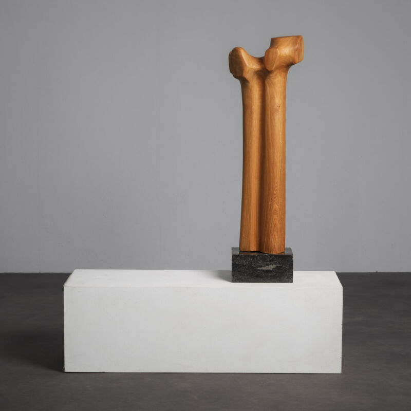 Biomorphic modernist sculpture in carved wood on stone base, Netherlands, 1970s, front view