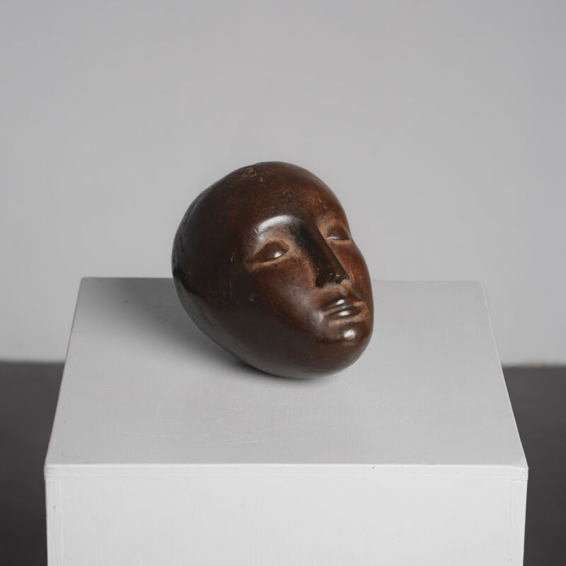 Modernist bronze sleeping head sculpture, 1960s, three-quarter front view
