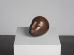 Modernist bronze sleeping head sculpture, 1960s, three-quarter side view