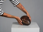 Modernist bronze sleeping head sculpture, 1960s, scale view